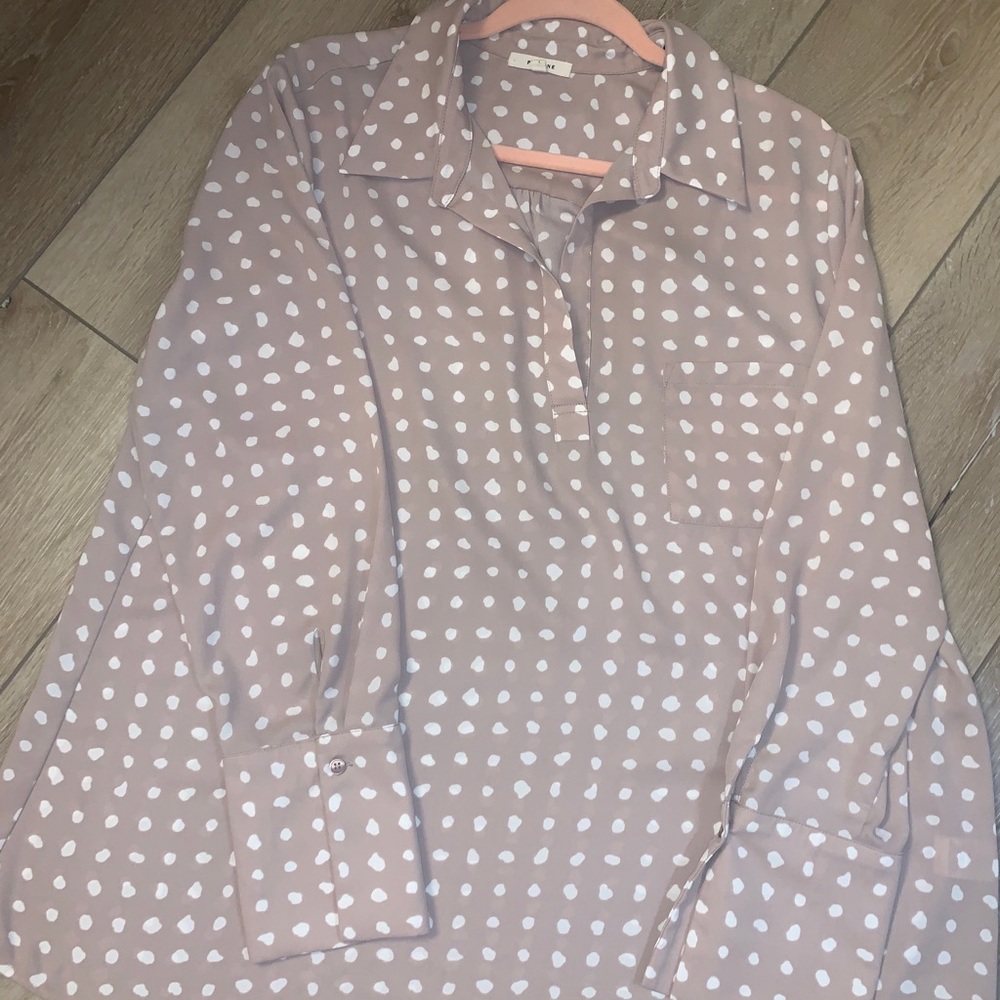 Adorable pale pink blouse.